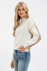Neutral Exposed Seam Sweater