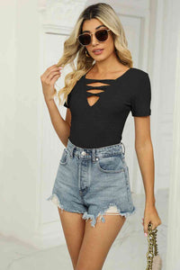 Twisted V-Neck Tee in Black - DOORBUSTER