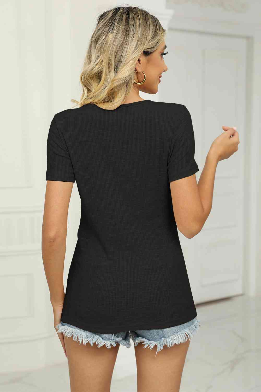 Twisted V-Neck Tee in Black - DOORBUSTER