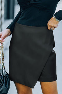 Asymmetrical Faux Leather Mini Skirt in Black